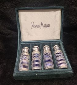 Vintage Neiman Marcus cobalt blue silver plated salt and pepper shakers.
