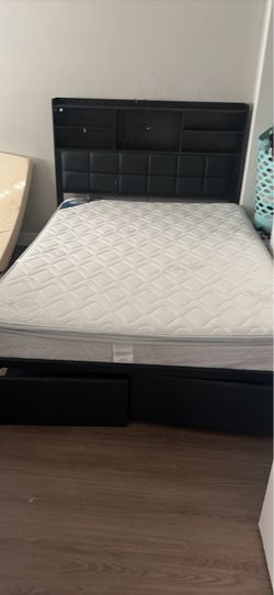 Full size bed frame with mattress and LED lights