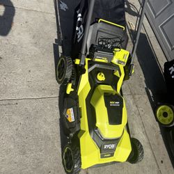Lawnmower ryobi push 21 inch blade costumer return to Home Depot like new $199 come w 1 -6ah battery and fast charger