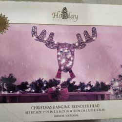 Holiday Elegance brand Christmas hanging reindeer head is a lighted indoor/outdoor decoration