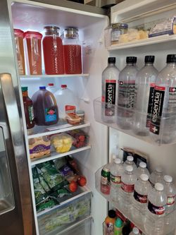 Frigidaire 25.6-cu ft Standard-Depth 36-in Wide Side-by-Side Refrigerator with Ice Maker ( Fingerprint Resistant Stainless Steel )