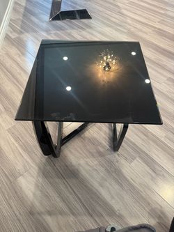 Black tempered glass table