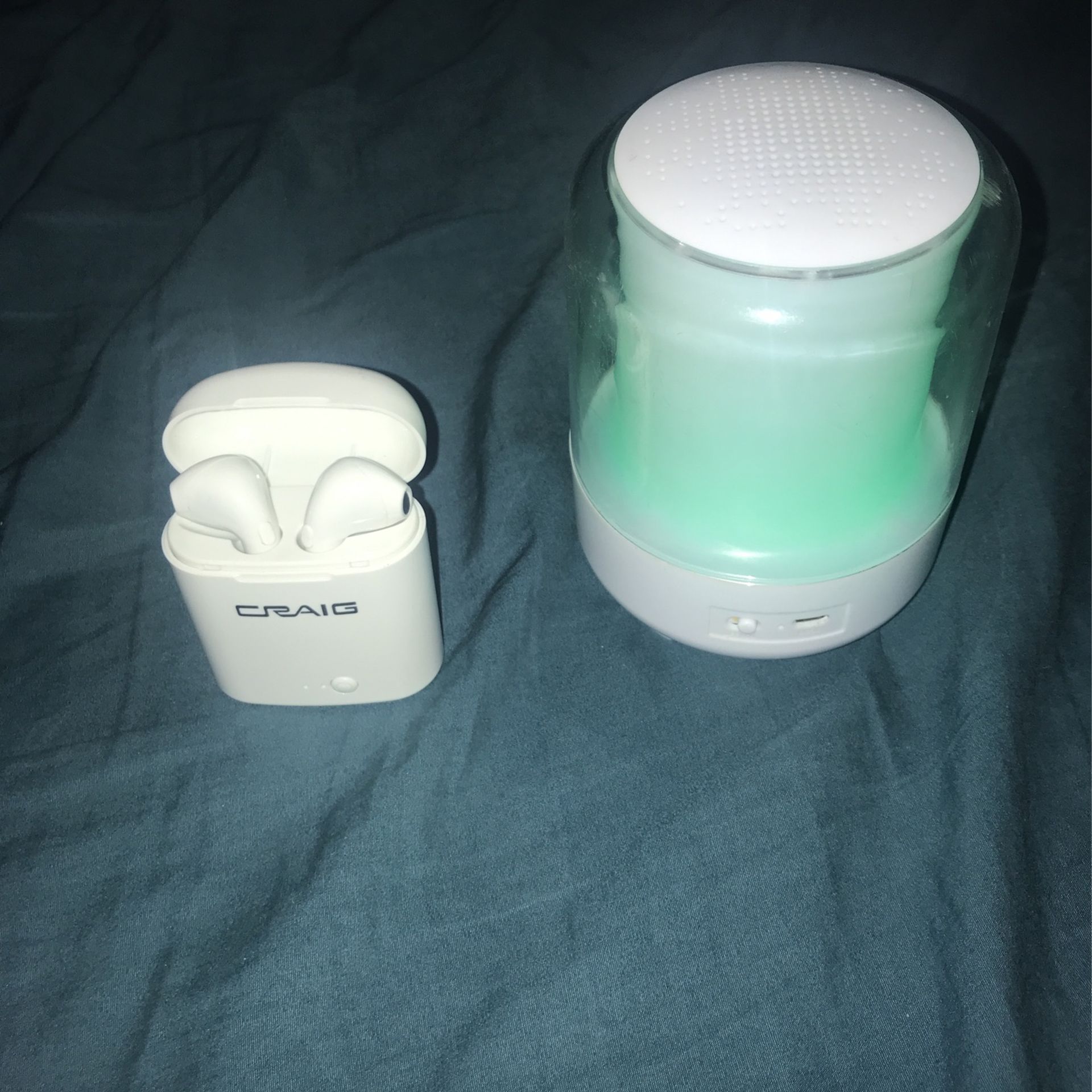Bluetooth Headphones And A Bluetooth Speaker