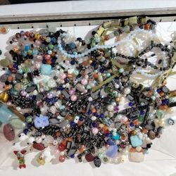 Over 2 pounds of a variety of beautiful exotic and detailed beads and magnetic beads ready to use.