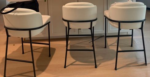 White leather barstools