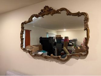 An ornate horizontal gold mirror 56Wx40H