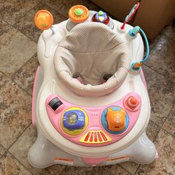 Storkcraft 3-in-1 Activity Walker and Rocker with Jumping Board and Feeding Tray, Interactive Walker for Toddlers and Infants, Pink