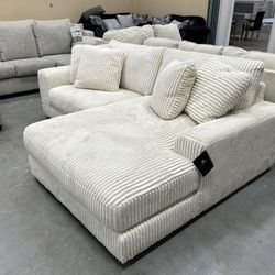 Lindyn Ivory 2 Piece Sectional Sofa Chaise 