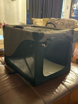 Small soft sided dog kennel