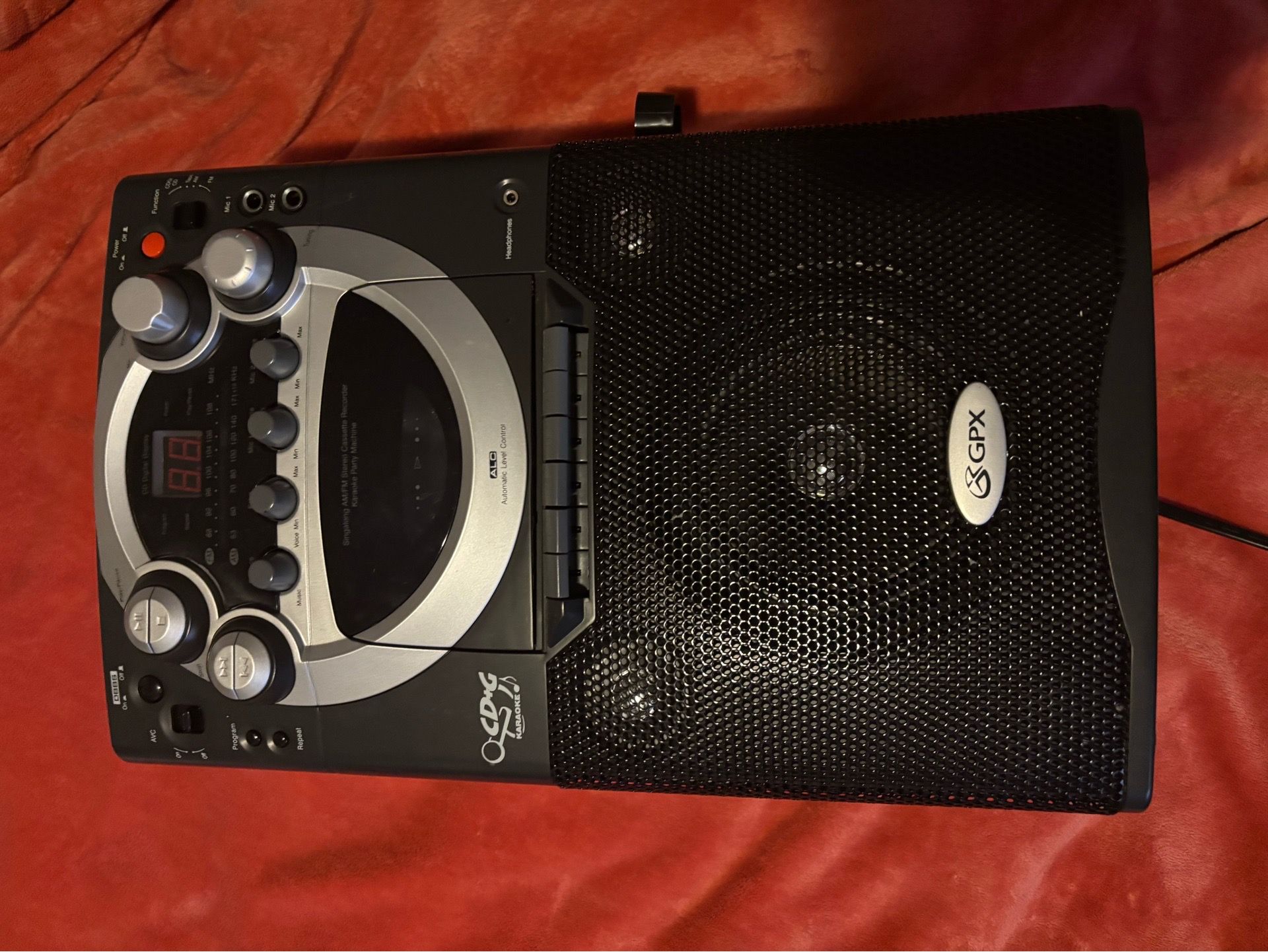 This is a GPX C1475 CD+G Karaoke Party Machine.