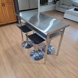 Stainless Steel Table W/ 4 Adjustable Stools