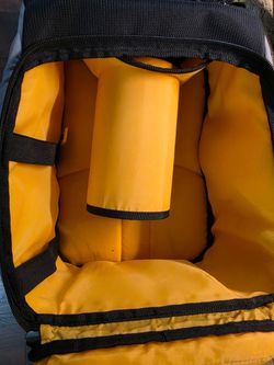 Logic camera bag and telephoto lens holder