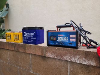 12 volt car battery charger 55 Amps and 3 new batteries.