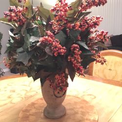 Floral arrangement in ceramic vase