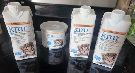3 new bottles and unopened can of KMR  milk