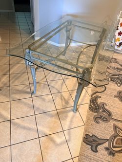 Glass and metal dining table
