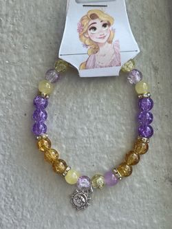 Handmade Rapunzel glass bead bracelet