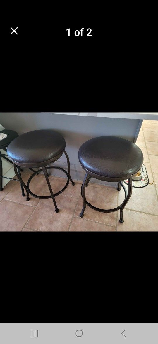 2 Counter Height Leather Swivel Stools