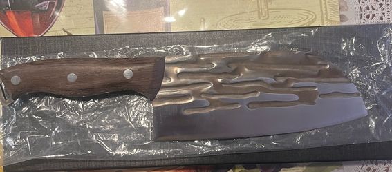 New kitchen knife with cool textured blade