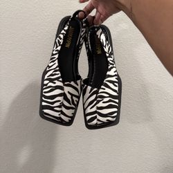 zebra print slingback flats with a square toe and a chunky sole shoe