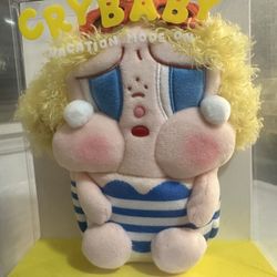 The *NEW* POP MART CRYBABY Vacation Mode On Series-MINI Crossbody Bag is a limited edition collectible featuring the character Crybaby from the POP MA