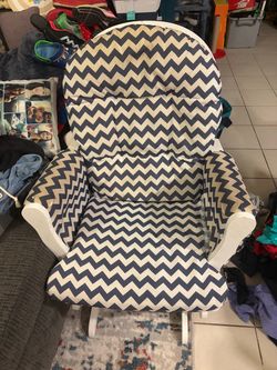 White Wooden Glider Rocking Chair with Blue and White Cushions and ottoman