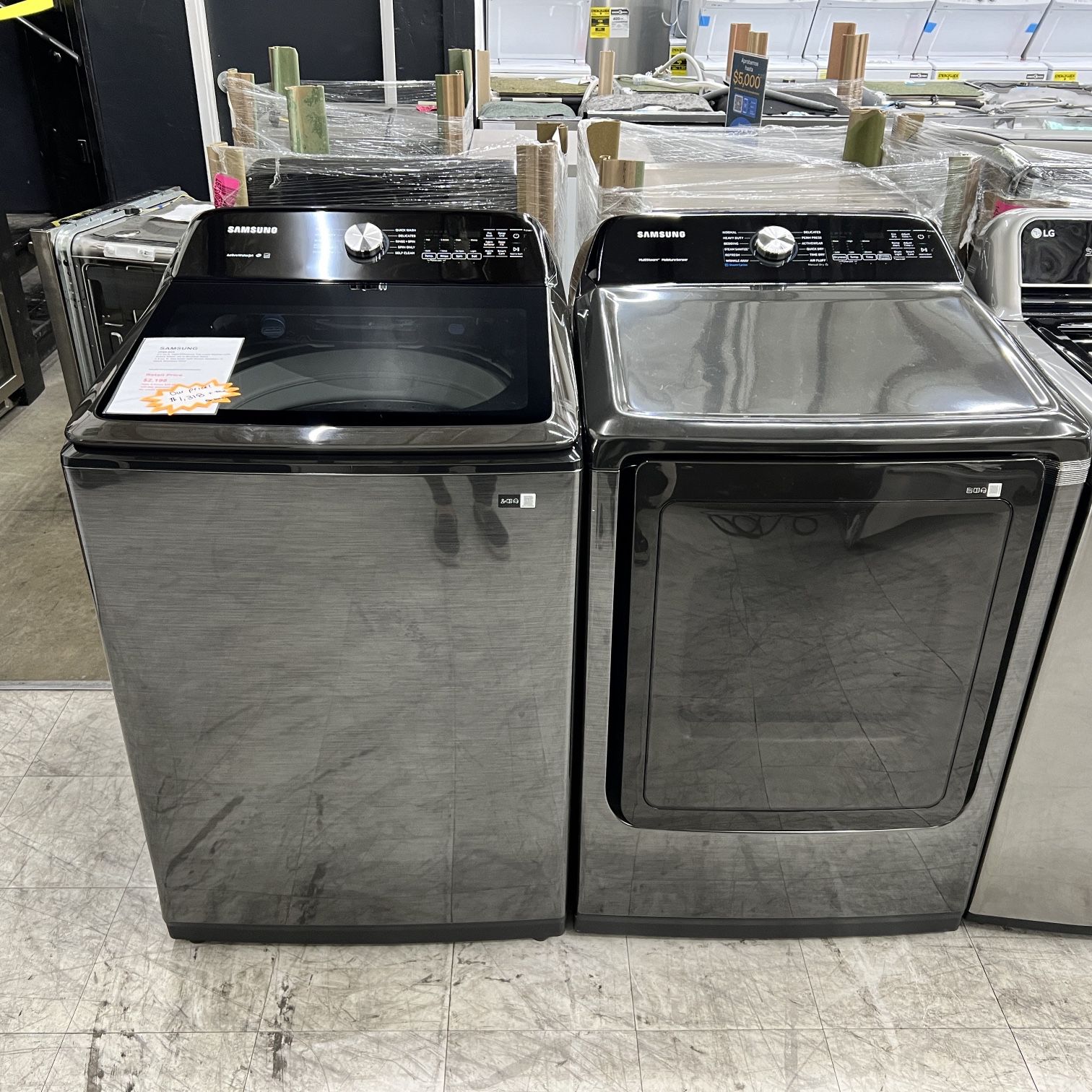 SAMSUNG 5.0 cuft washer and gas dryer black stainless 