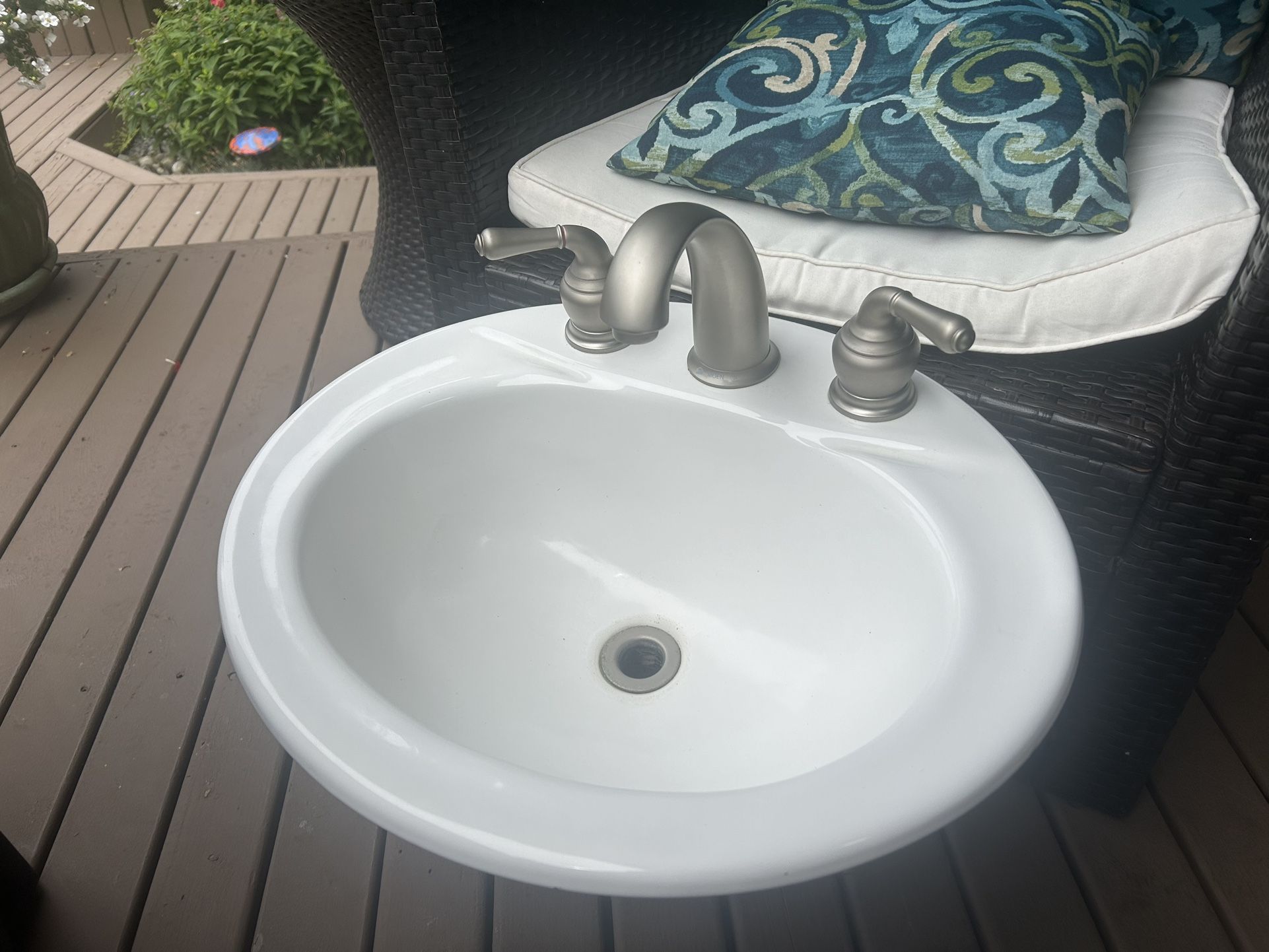 Bathroom sink & Moen Faucet.