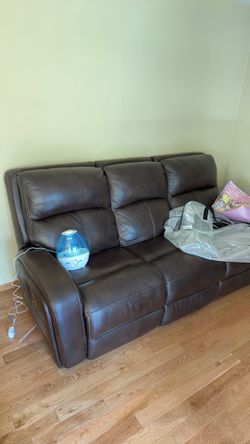 Three person leather sofa plus side table