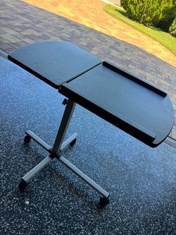Multi functional height adjustable table