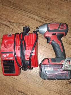 Milwaukee m18 impact driver / battery & charger