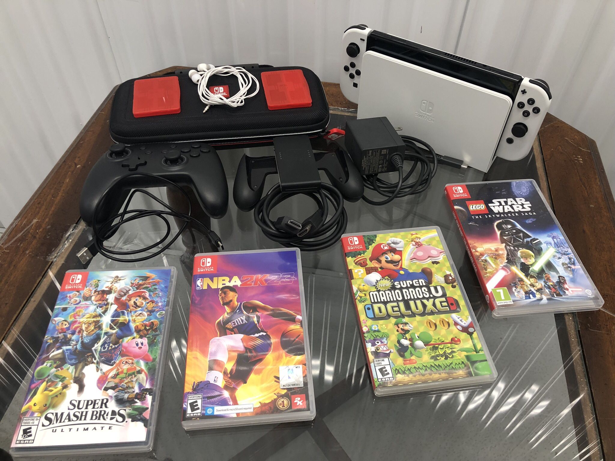 Nintendo Switch OLED Console 64GB - 4 Game Bundle + Pro Controller + Travel Case