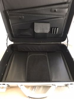 Mezzo caliber series briefcase with original strap.