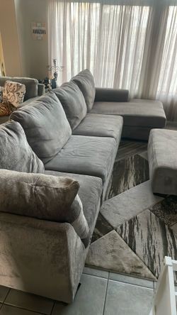 Sectional Set Of Sofa /Complete With Table All Of It.