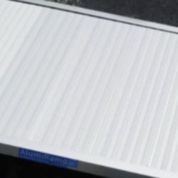 AlumiLite Solid Curb Ramp WE MAKE IT SAFE The ALUMILITE SOLID CURB RAMP is ideal for use as a short fixed ramp or for temporary needs. All welded alum