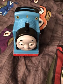 Talking Thomas throw coins in and he talks
