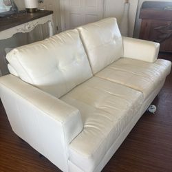 Two Used Faux Leather Couches - white 