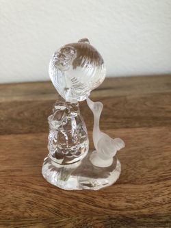 Crystal girl with goose figurine