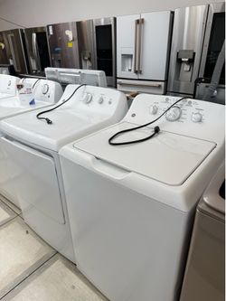 Ge top load washer and gas dryer set