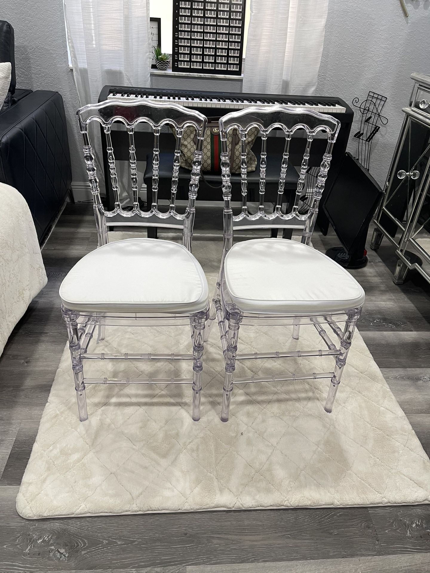2 acrylic chairs