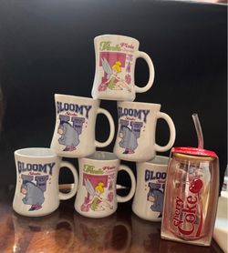 Disney mugs and a cherry coke tumbler