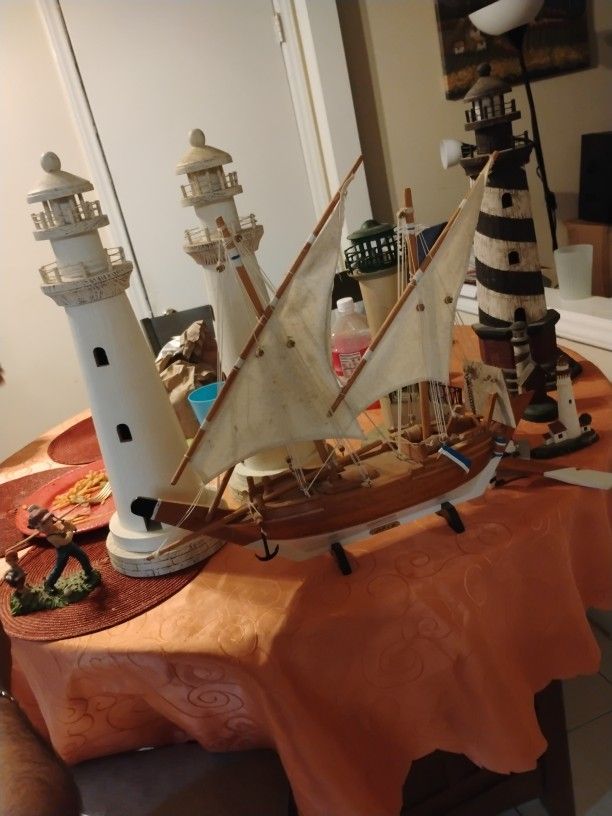 Light Towers And A Model Boat