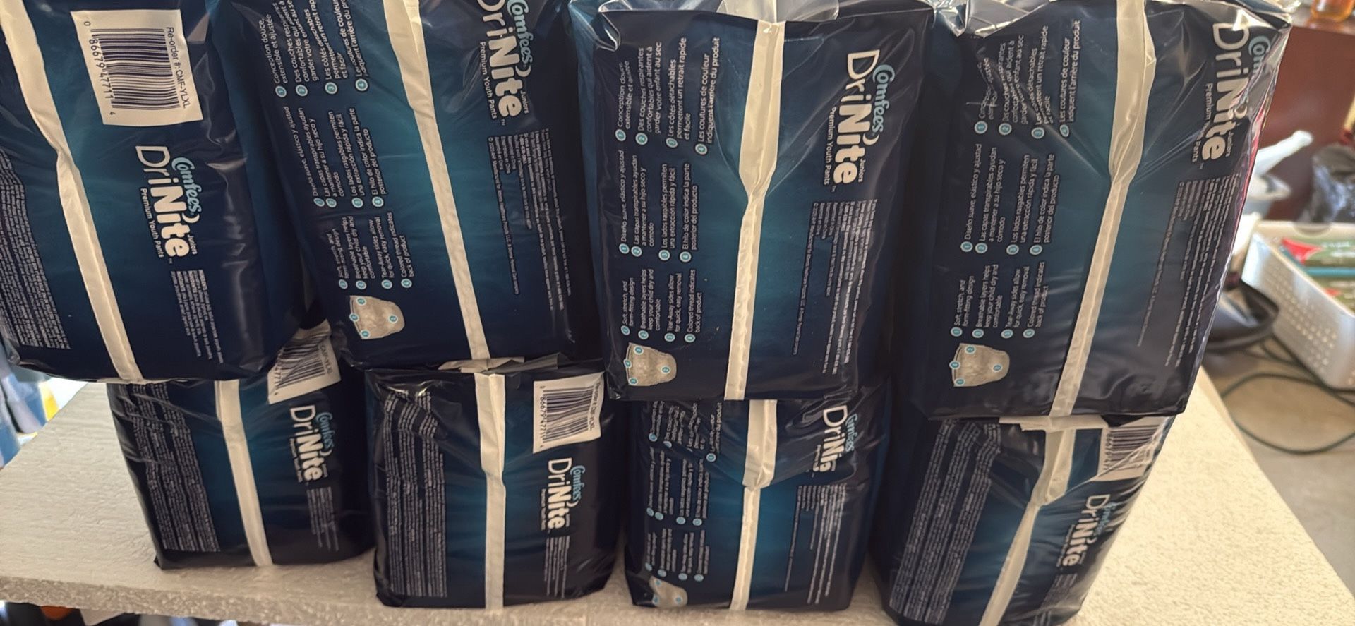 16 packs of Comfees DriNite premium youth pants L/XL 60- 125 + Lbs 27 -57 +kg 13 youth pants per pack Pick up or meet up ⬆️ in Powder Springs Ga 301