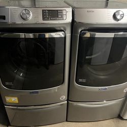 New Maytag Front Loading Washer And Stackable Gas Dryer Set In Stainless Steel With Pedestals 