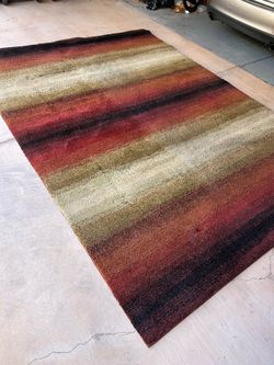 Beautiful rust, beige, brown rug