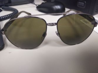 AUTHENTIC GUCCI SUNGLASSES serial number GG0054S
