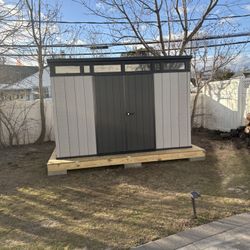 Shed Assembly With Base Construction 