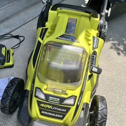 RYOBI 40V 20” Brushless Lawn Mower – 2 Batteries + Charger + Manual