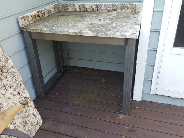 Steel table with granite