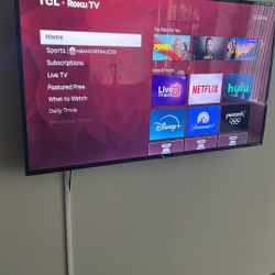 **MOVING- MUST BE GONE TODAY** 65” Smart TV with wall mount. 